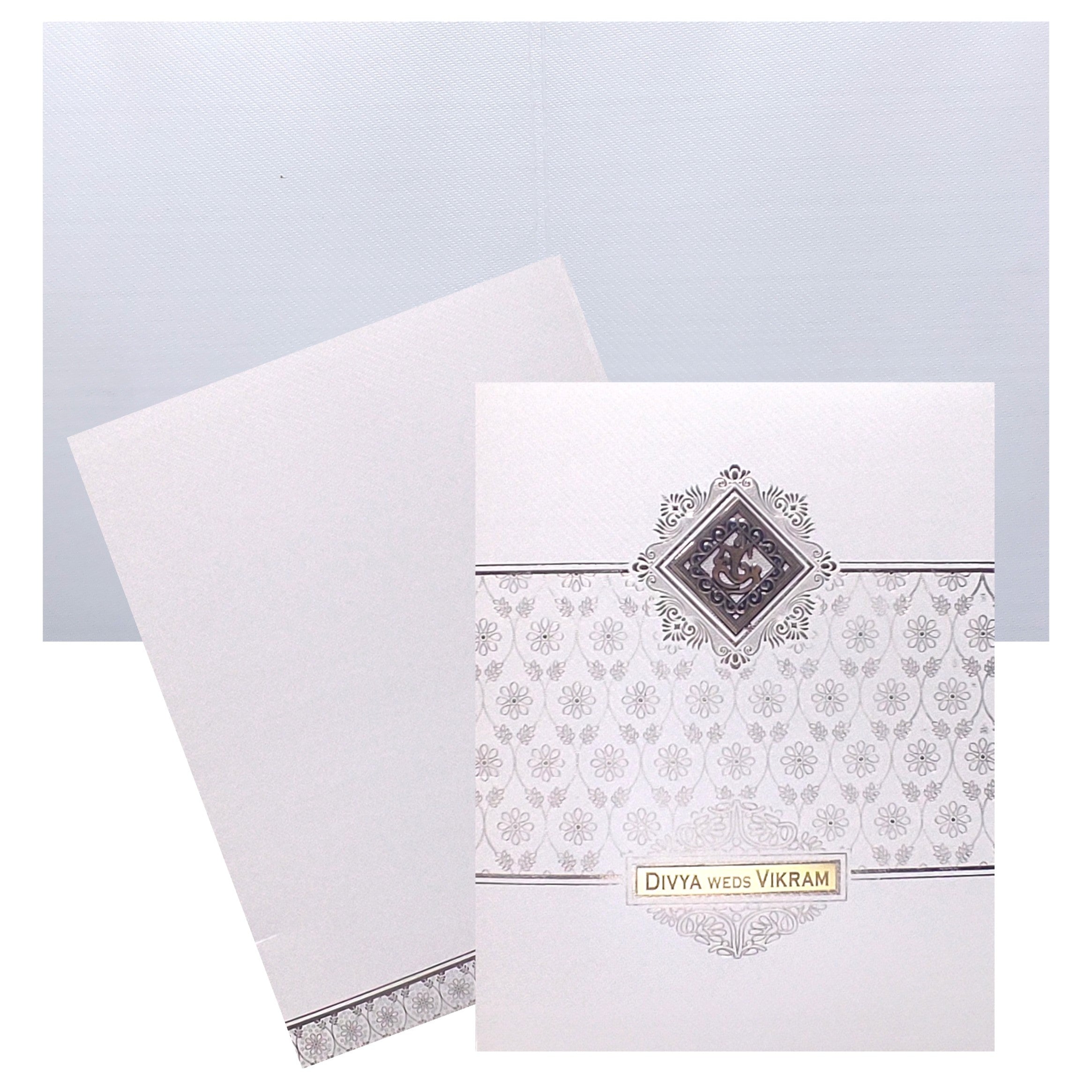 Selling White Ganesha Floral invitation card online. Buying invitation cards made easy with King of Cards! ?Customer Support ?Home Delivery.