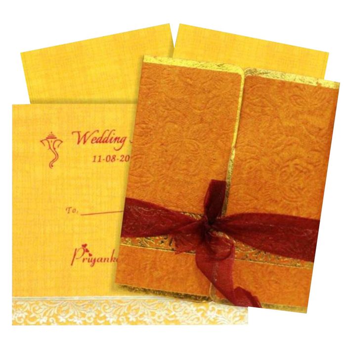 This wedding card is a horizontal sort wedding card. This wedding card is exceptional from other wedding card by a ribbon on the card. This card has a unconventional opening which makes it look trendy. This card is in gold shading.