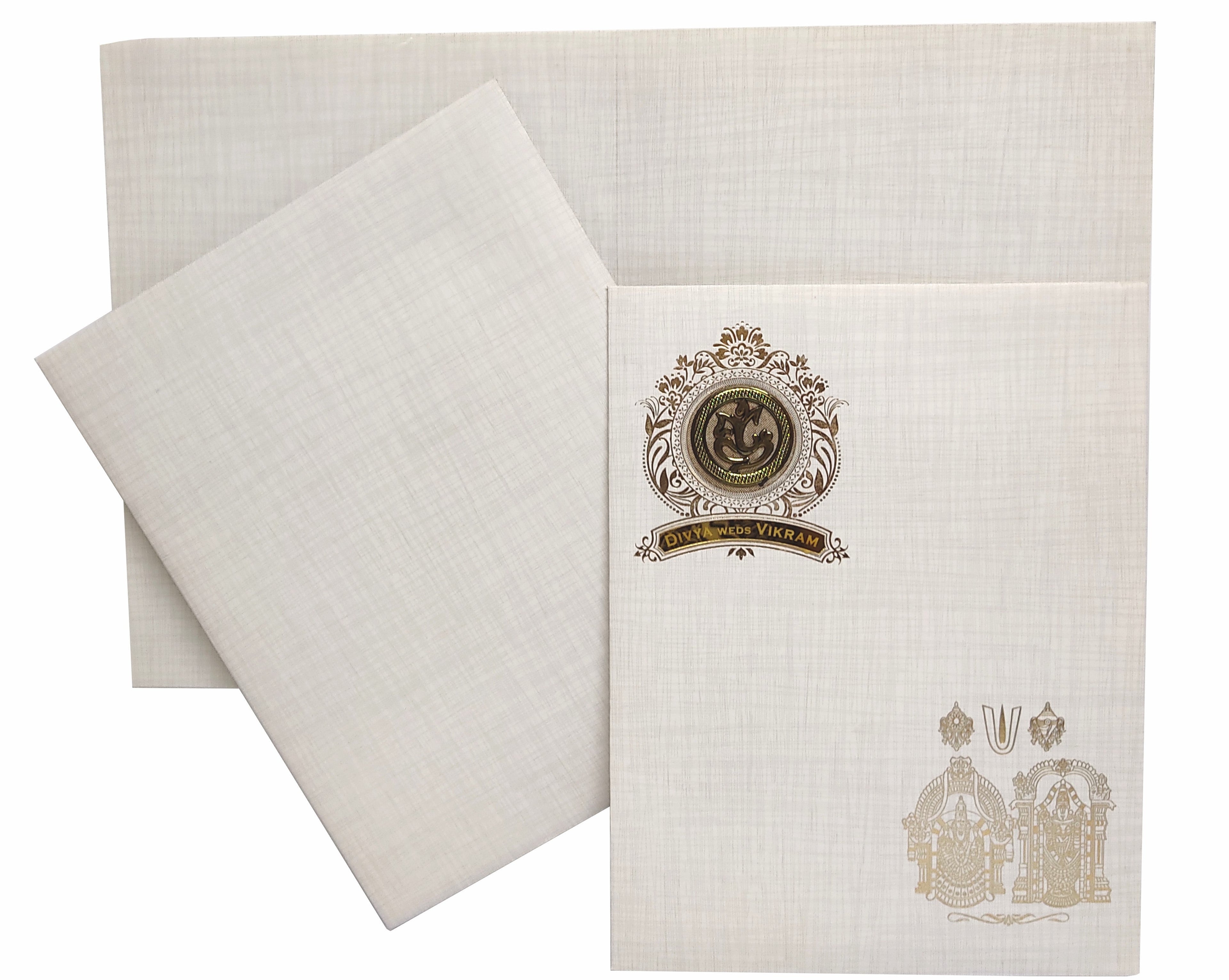 This popular design invitation card presents a gold foiling design at the top left with round embossed Ganesha sticker with bride and groom name plate in acrylic.