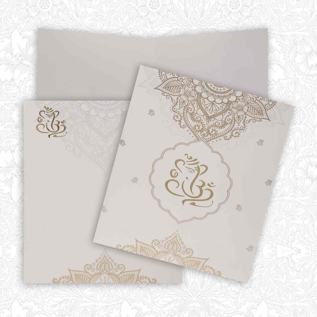 Gold Foiling Ganesha With Floral Theme Wedding Card - KNK1316