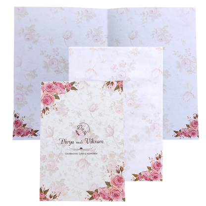 Pink personal invitation p with floral print at the borders in gold foiling.