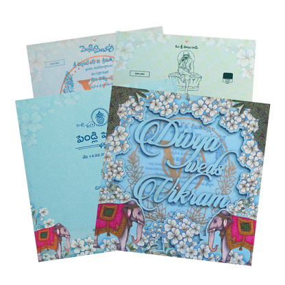 Check out Blue Floral Elephant Cutout Wedding Card at best price. ✅WhatsApp Support ✅Express Delivery.|King of cards.