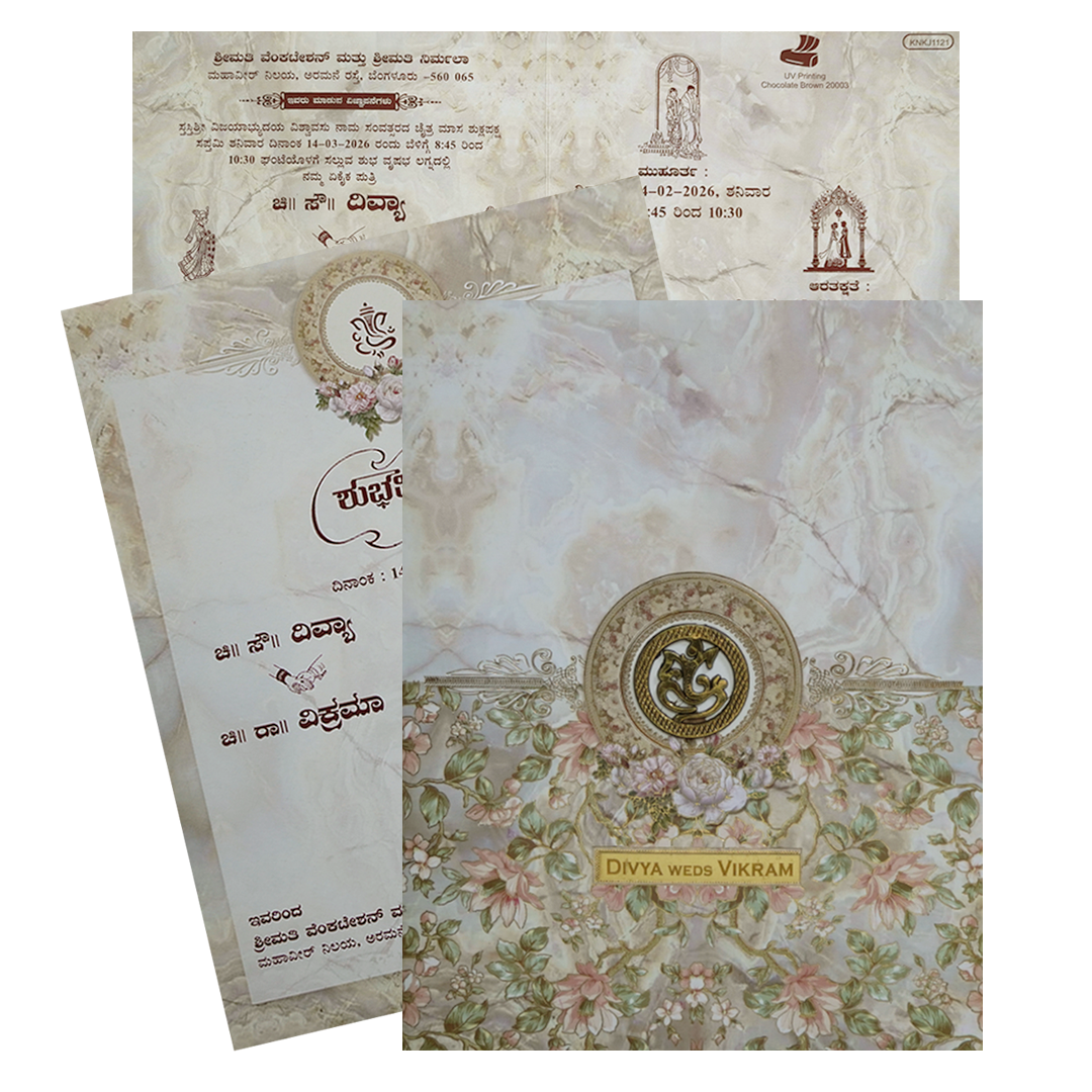Cream floral indian wedding card features smoky print and arclyic name plate with ganesha sticker and one insert. Shipping and printing charges are extra.