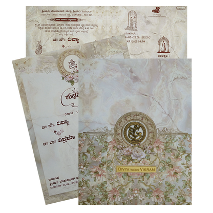 Cream floral indian wedding card features smoky print and arclyic name plate with ganesha sticker and one insert. Shipping and printing charges are extra.