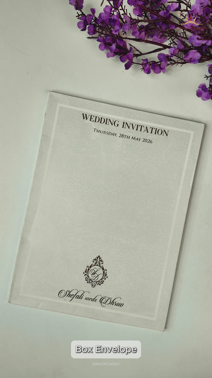 White Embossed Ganesha Wedding card-KRE28470