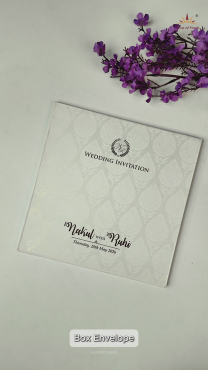 White Ganesha Umbrella Embossed Wedding card-KRE28530