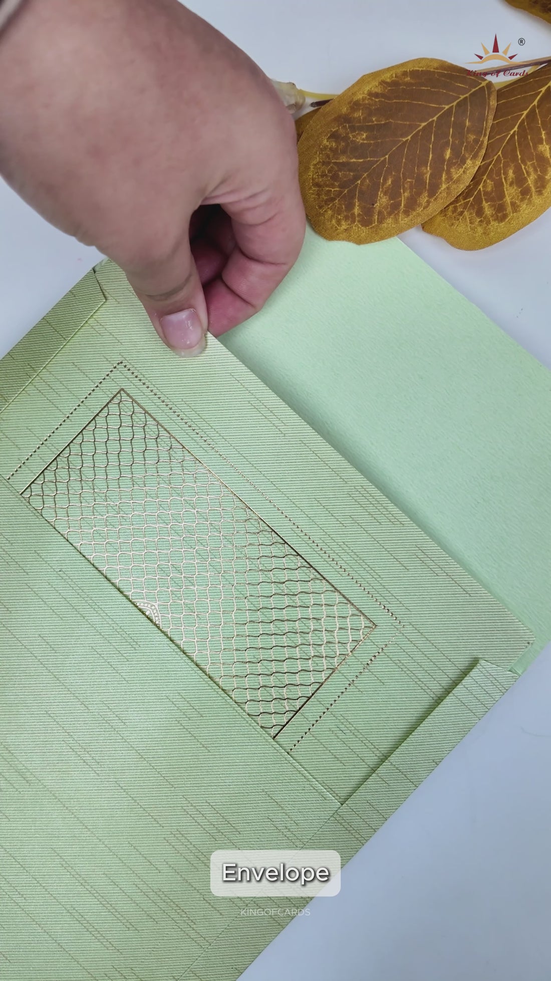 Green Ganesha Lotus Embossed Wedding Card-KNRM7085N