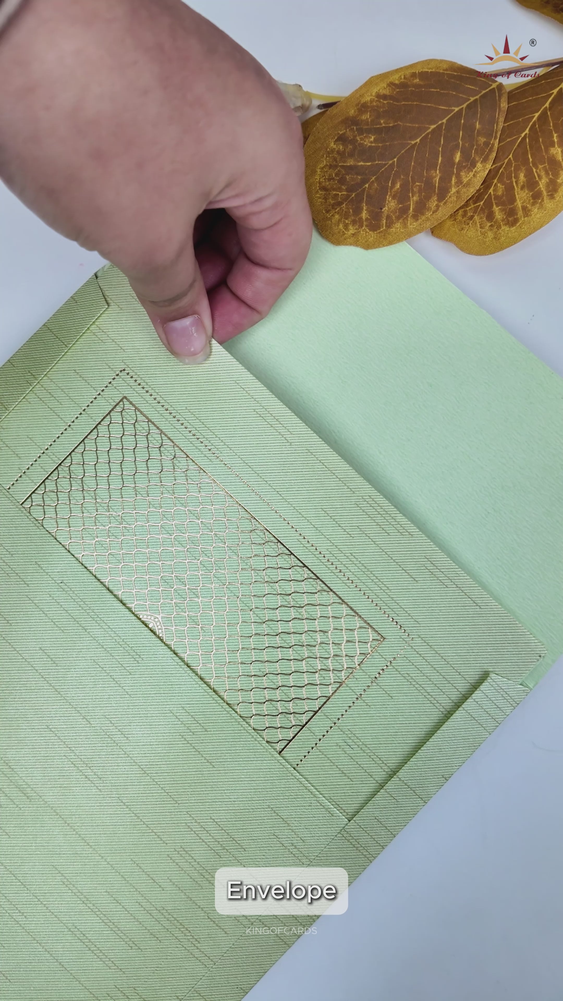 Green Ganesha Lotus Embossed Wedding Card-KNRM7085N