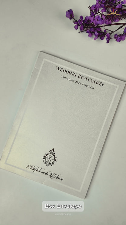 White Monogram Ganesha Embossed Wedding card-KRE28440