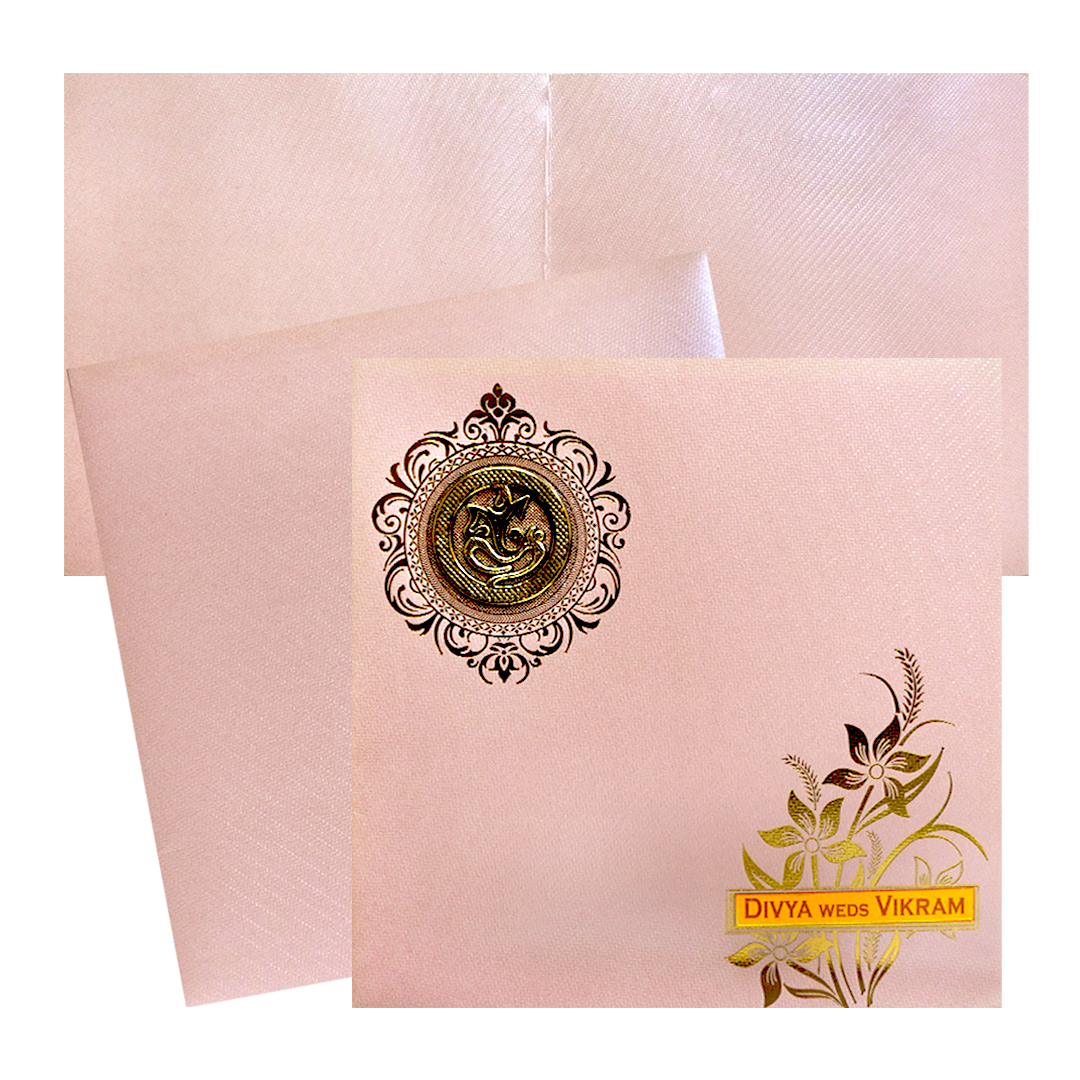 Pink Shiny Wedding Card featuring ganesha sticker, floral gold foiling design and an acrylic nameplate. It also includes folded insert and an envelope.   Shop now! ?WhatsApp Support ?Express Delivery.